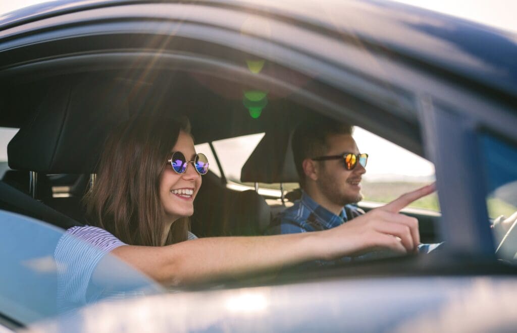 Happy couple on smooth drive because of used tires