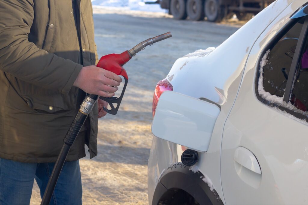 Filling up car with gas after improving winter fuel economy