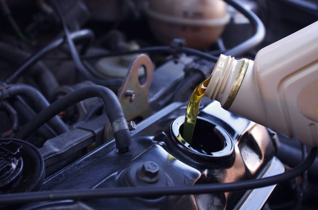 Performing oil change on car with cheap tires