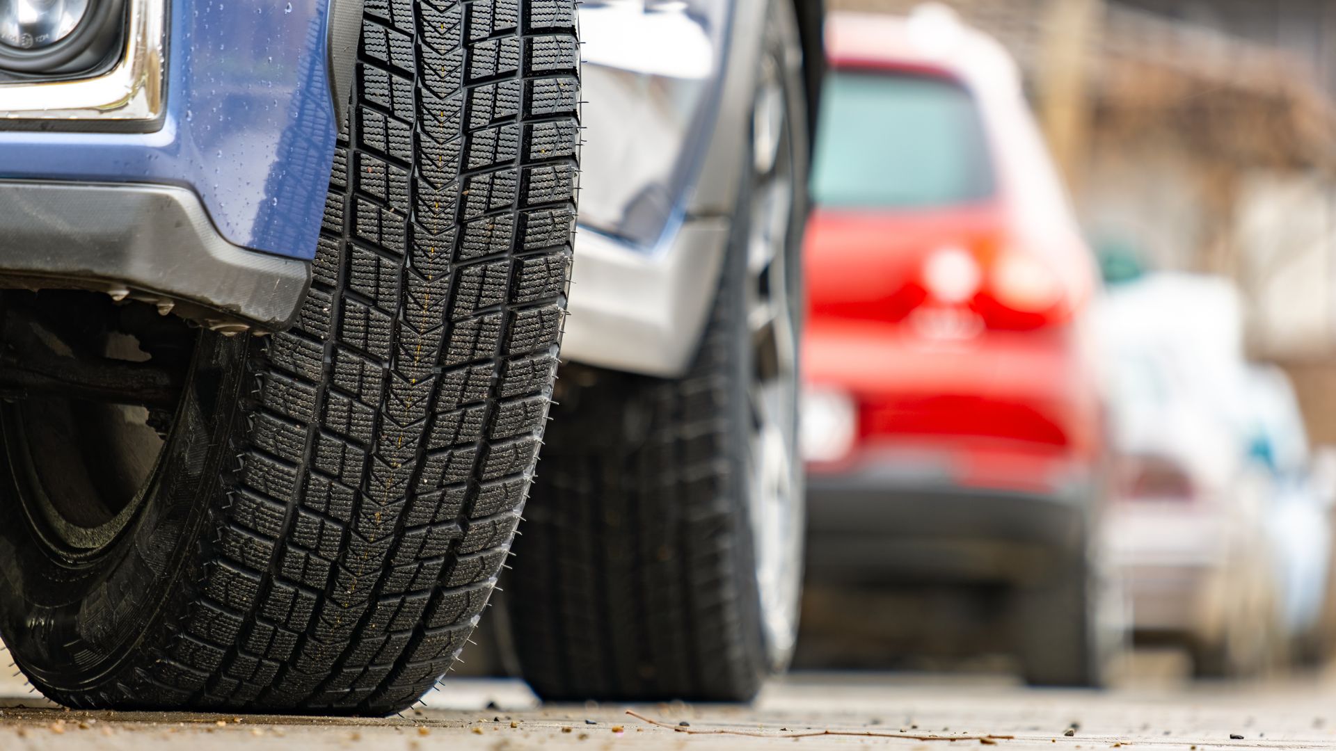 Vehicle with newly installed used tires during a tire changeover in Kelowna